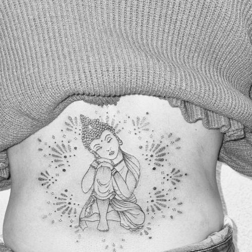 Tatouage bouddha dans le dos 