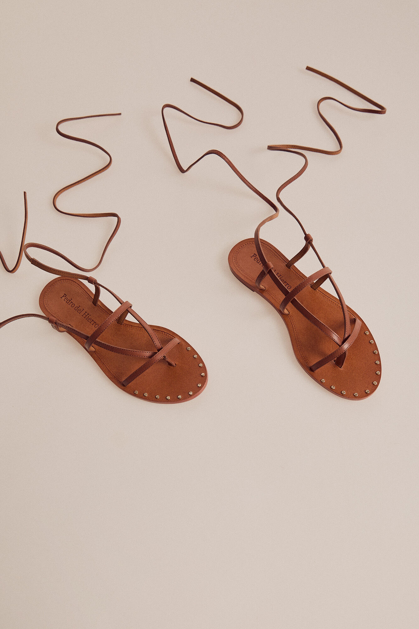 sandales plates nouées en cuir nappa