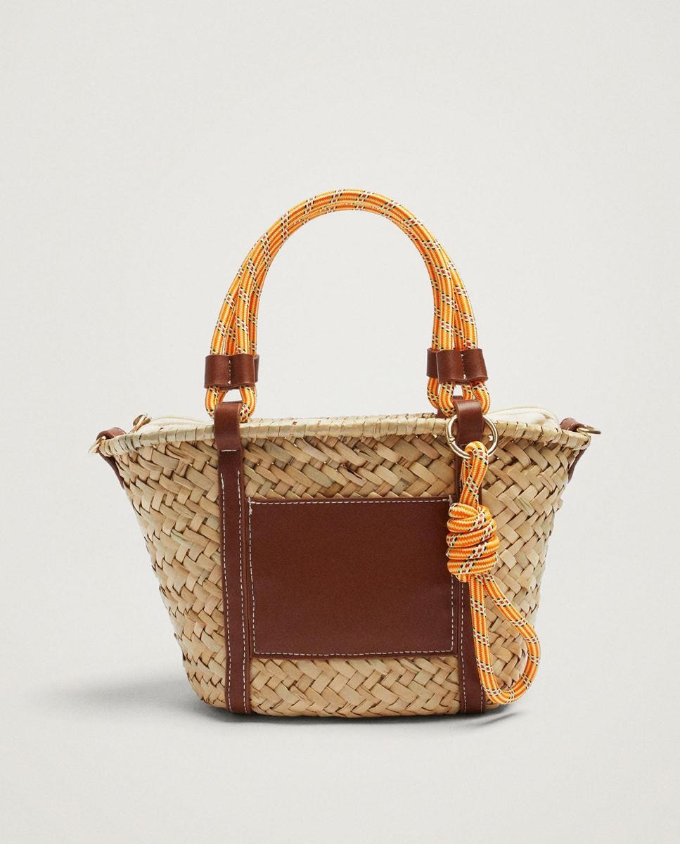 Sac cabas en raphia marron.