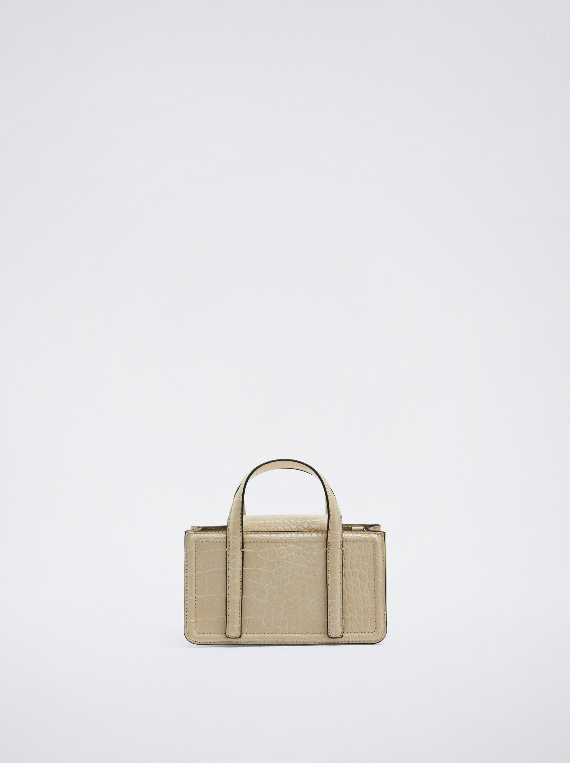 Un fourre-tout compact beige uni.