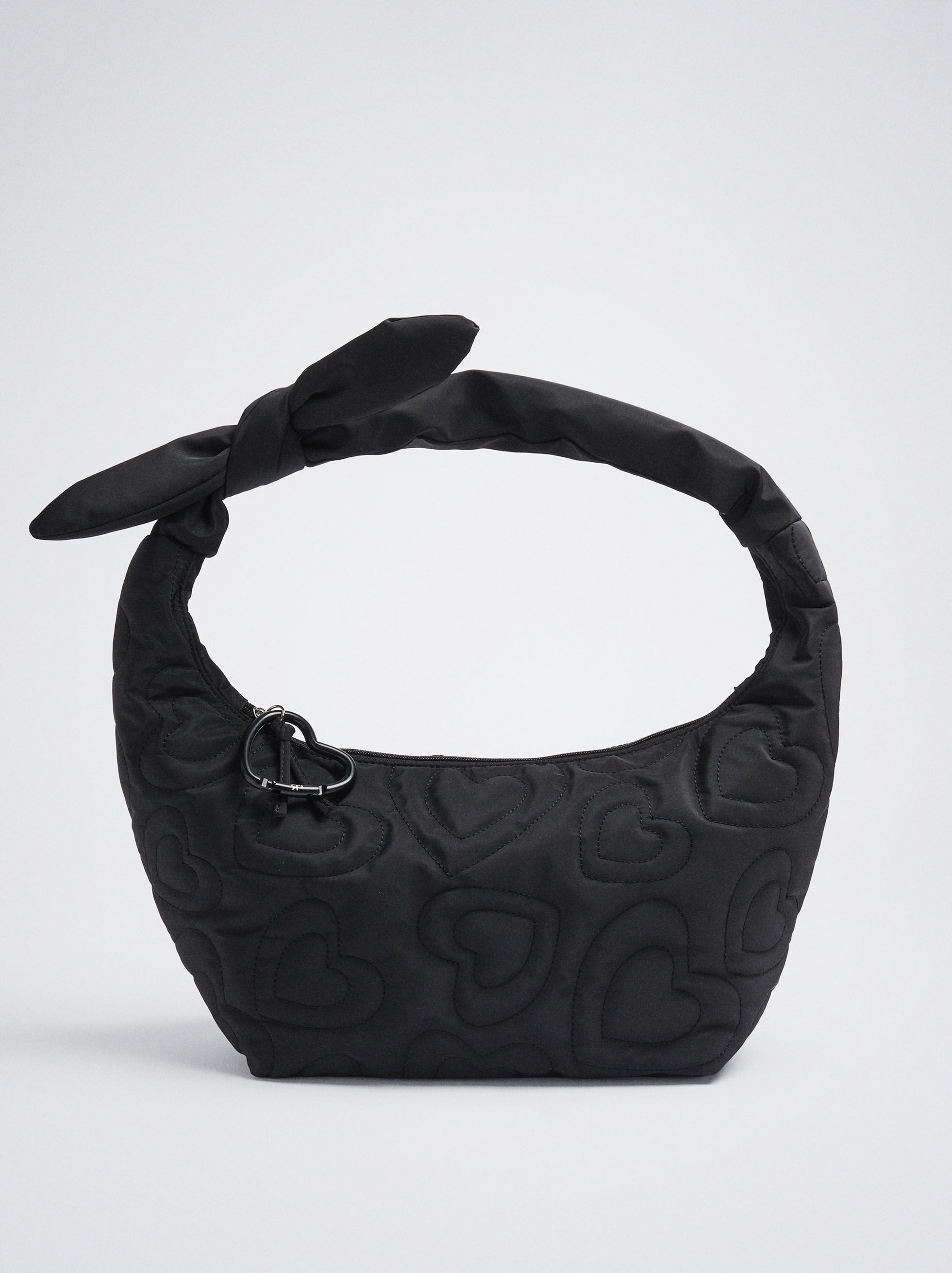 Sac à bandoulière en point de cœur noir.